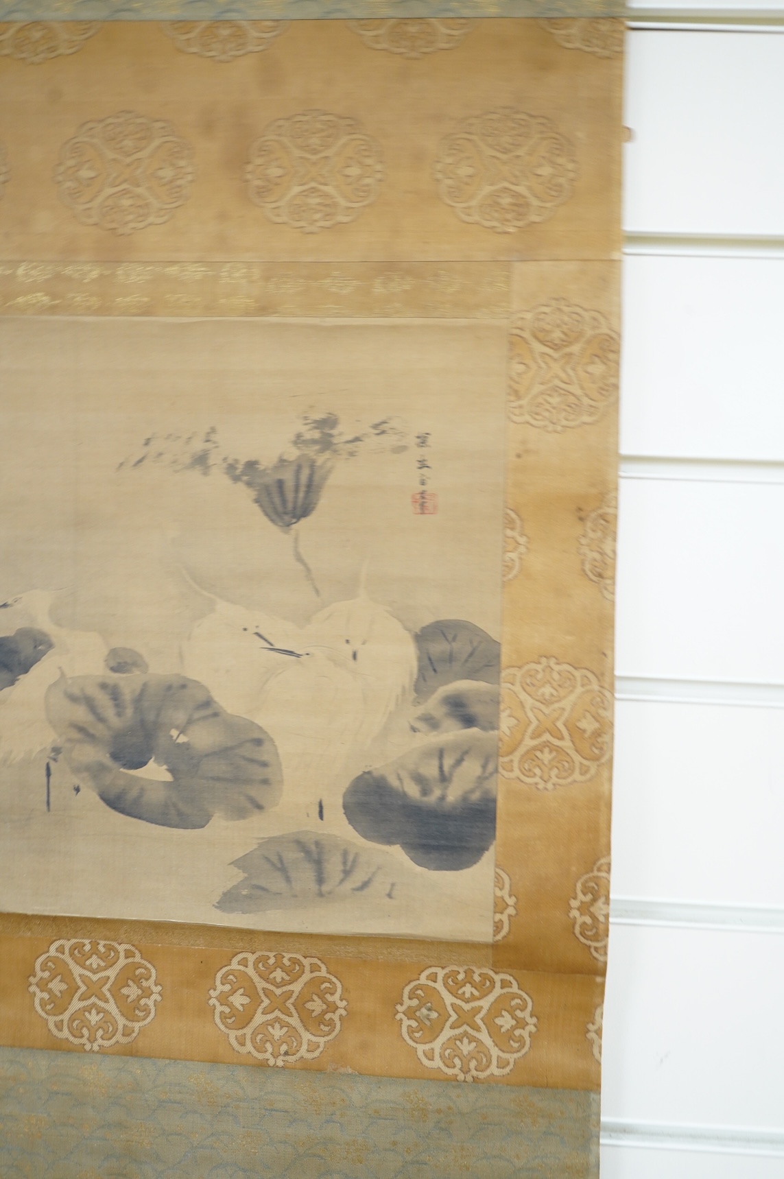 Four Japanese scrolls, to include a monochrome study of birds amongst lily pads, each boxed